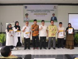 PJ WaliKota Jasman Serahkan SK Unit Pengumpul Zakat Payakumbuh